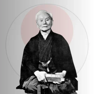 Sensei Gichin Funakoshi, founder of Shotokan karate-do, seated in traditional dress