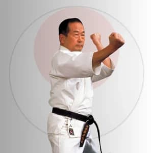 Sensei Masatoshi Nakayama, former JKA chief instructor, performing a karate stance in gi