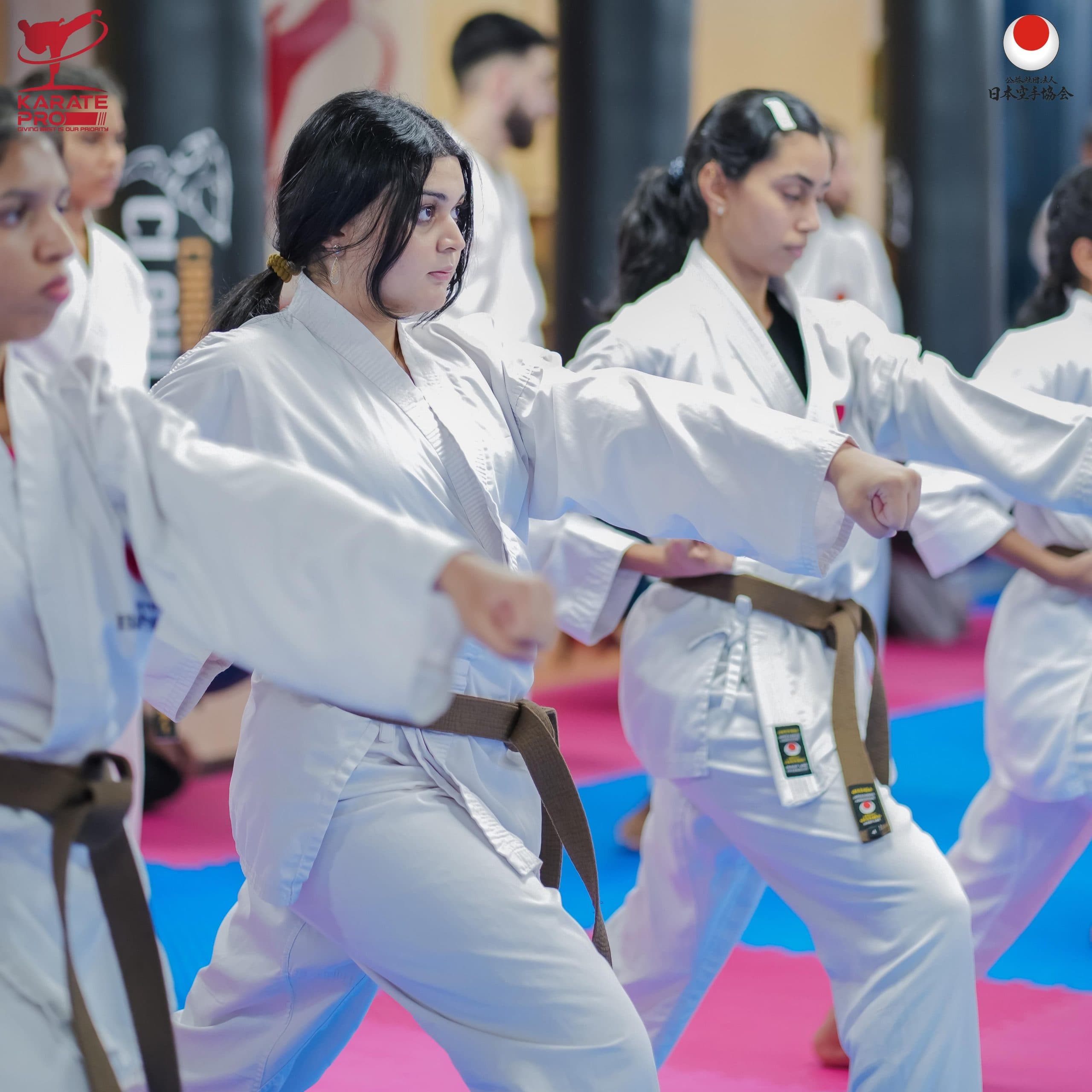 Teenagers training together in a karate class at Karate Pro Academy